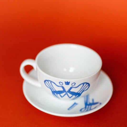 Tea cup and saucer- Keter chair
